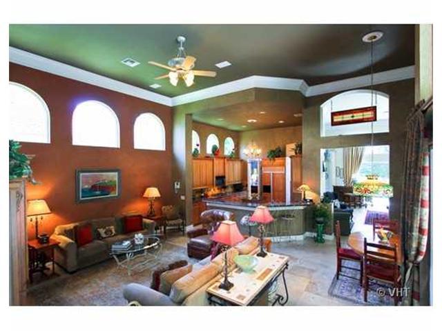 7096 Vía Marbella Boca Raton, FL 33433 - Photo 7 of 16 a living room with furniture and a large window