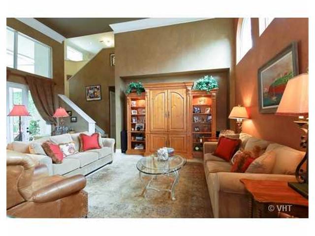 7096 Vía Marbella Boca Raton, FL 33433 - Photo 8 of 16 a living room with furniture and a floor to ceiling window