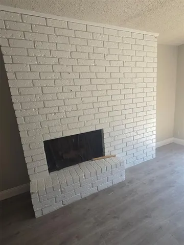 a living room with a fireplace