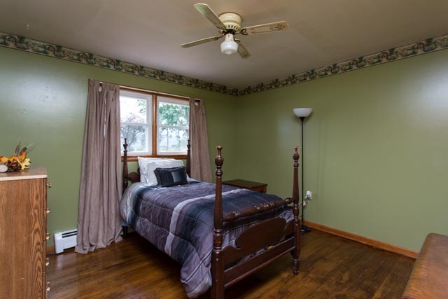 126 Cedar Ridge Road Waynesboro, VA 22980 - Photo 10 of 28 a bed sitting in a bedroom next to a window