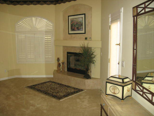 4055 North Recker Road, Unit 33 Mesa, AZ 85215 - Photo 7 of 17 Master Bedroom Fireplace
