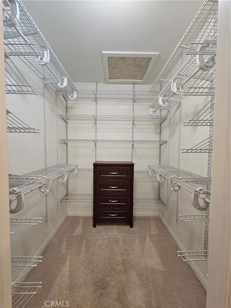 8933 Biscayne Court, Unit 221H Huntington Beach, CA 92646 - Photo 11 of 13 a view of a walk in closet