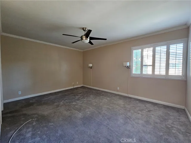 a view of a big room with carpet