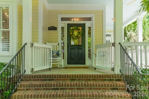 a view of a house with a porch