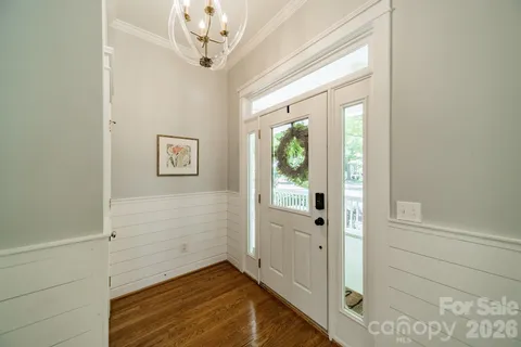 a view of a hallway with windows
