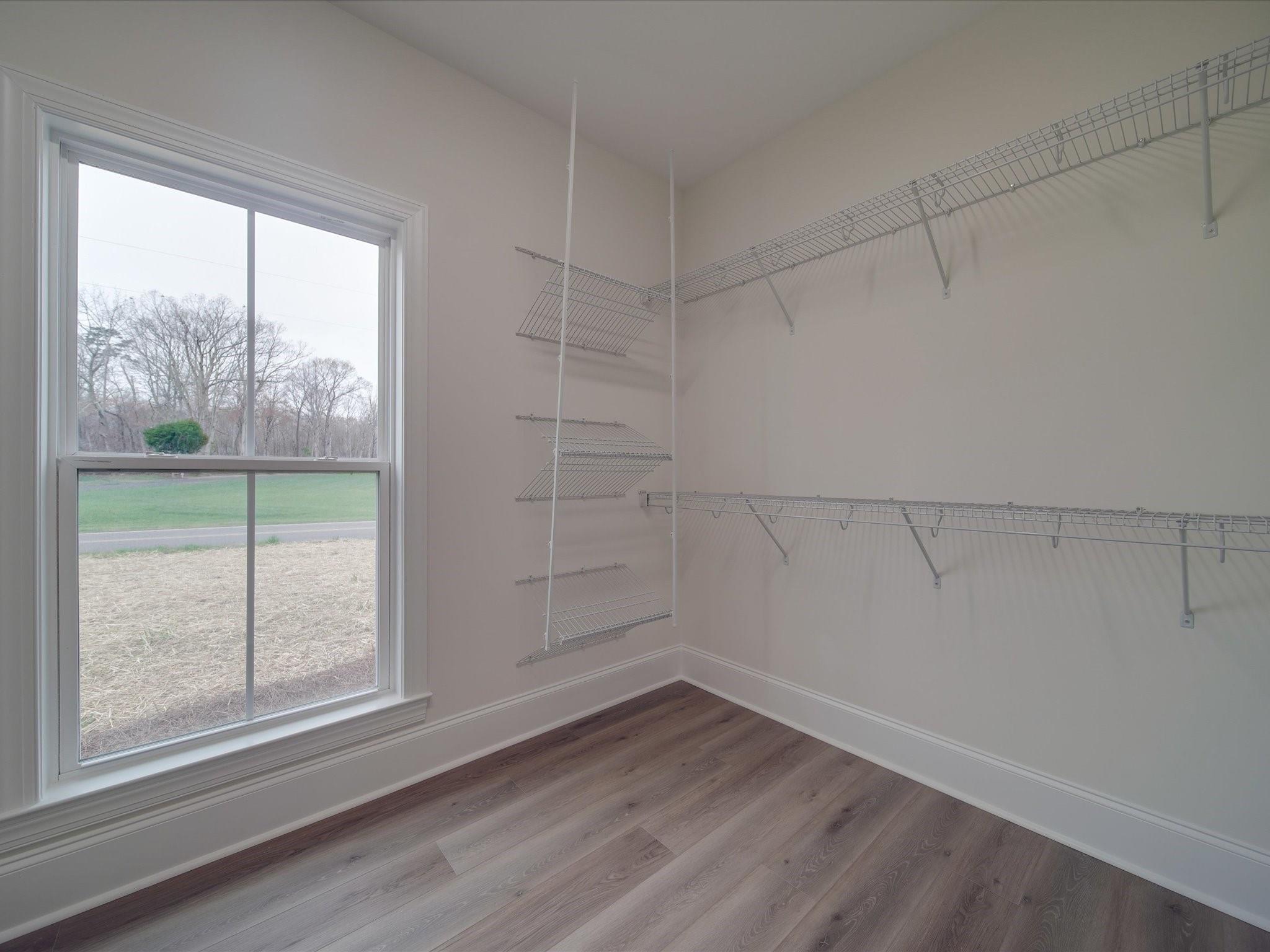 3815 East Brief Road Monroe, NC 28110 - Photo 46 of 46 a view of a small space with wooden floor and windows