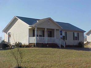 602 Highland Ridge Drive China Grove, NC 28023 - Photo 1 of 1 a front view of a house with a yard