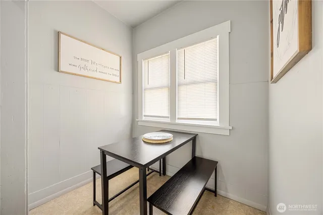 a room with chair and window