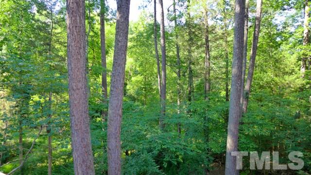 247 Fox Ridge Road Pittsboro, NC 27312 - Photo 19 of 24 The lot is simply spectacular. Gorgeous wooded vistas, bordered by a stream, with winter pond views to boot.