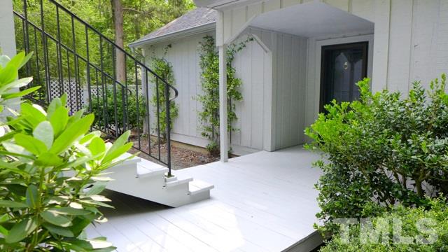 247 Fox Ridge Road Pittsboro, NC 27312 - Photo 3 of 24 The front deck is a lovely greeting spot, and great place to relax as well.