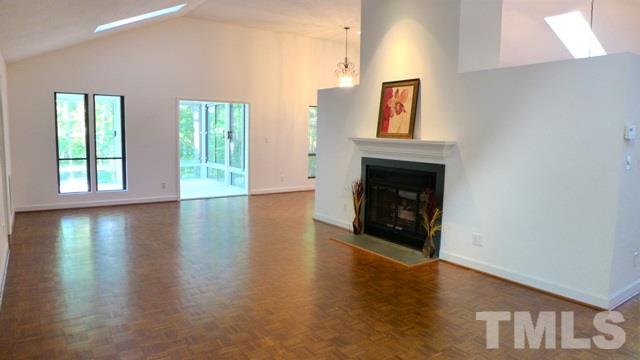 247 Fox Ridge Road Pittsboro, NC 27312 - Photo 6 of 24 The Living Room is large enough for multiple seating areas! A big and bright space.