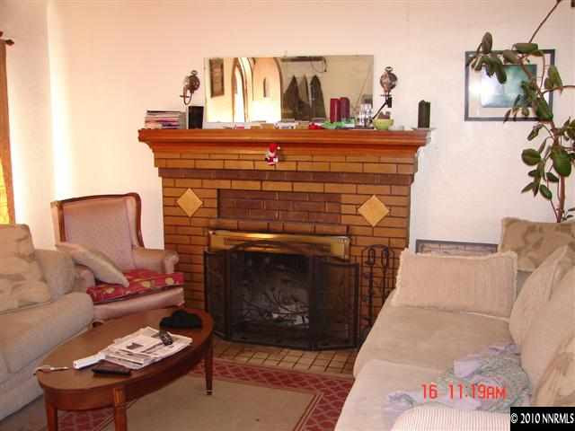 575 West 9th Street Reno, NV 89503 - Photo 7 of 9 a living room with furniture and a fireplace