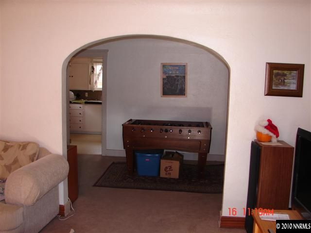 575 West 9th Street Reno, NV 89503 - Photo 8 of 9 a living room with furniture and a mirror