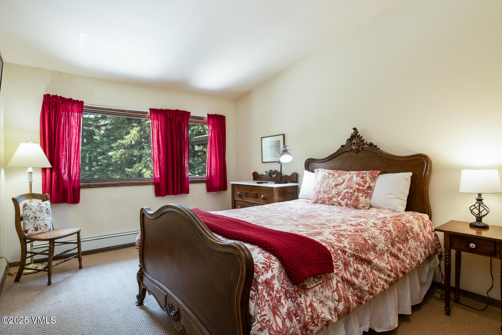 324 Beaver Dam Road, Unit B Vail, CO 81657 - Photo 14 of 22 a bedroom with a bed and a window