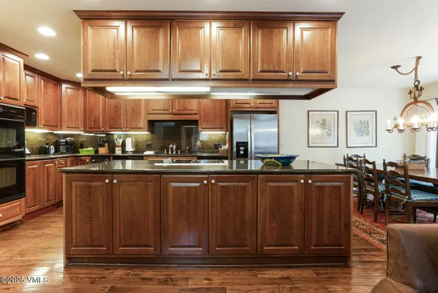 a kitchen with lots of counter space and a window