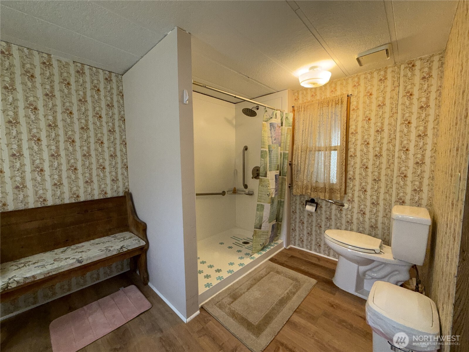 155 St Peters Creek Road Malo, WA 99150 - Photo 14 of 40 a bathroom with a toilet and a shower
