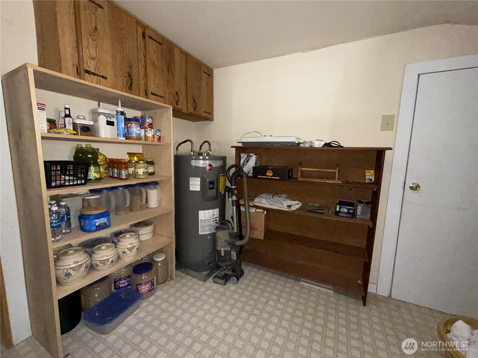 155 St Peters Creek Road Malo, WA 99150 - Photo 18 of 40 a view of walk in closet with clothes and shoes