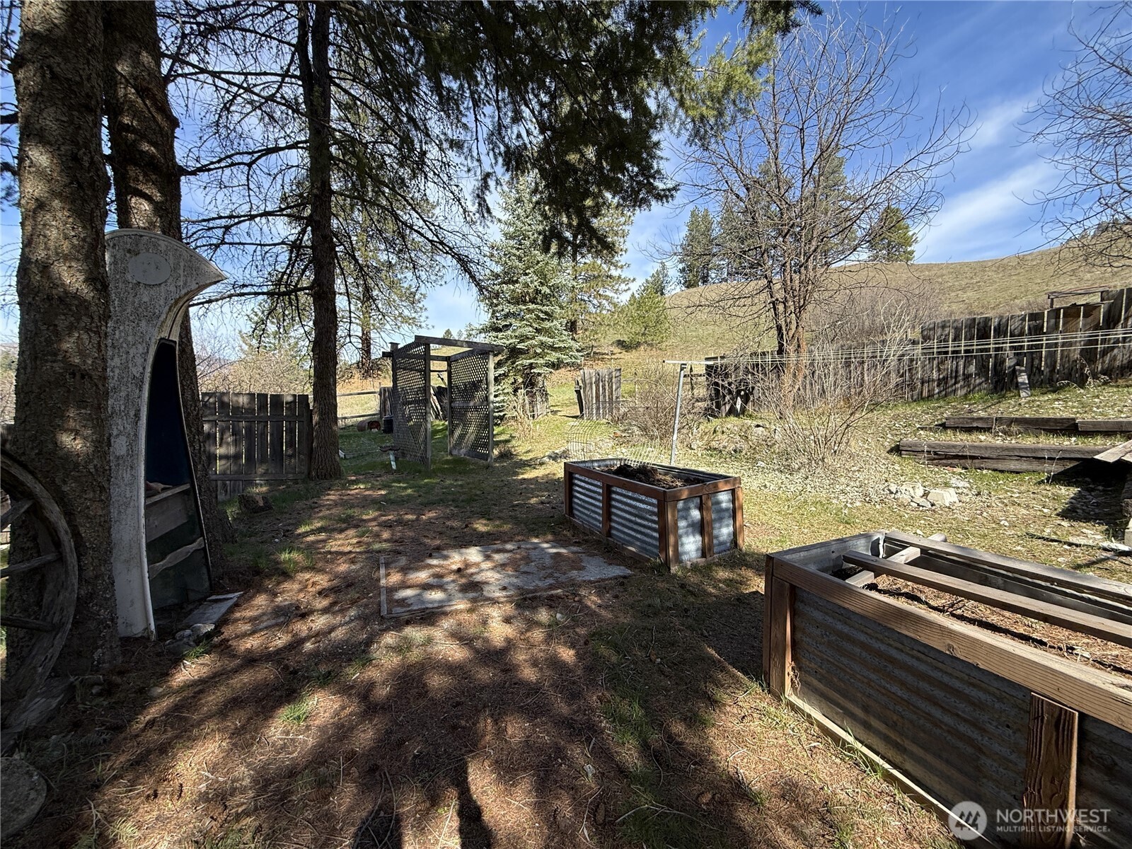 155 St Peters Creek Road Malo, WA 99150 - Photo 24 of 40 a view of a backyard with sitting area