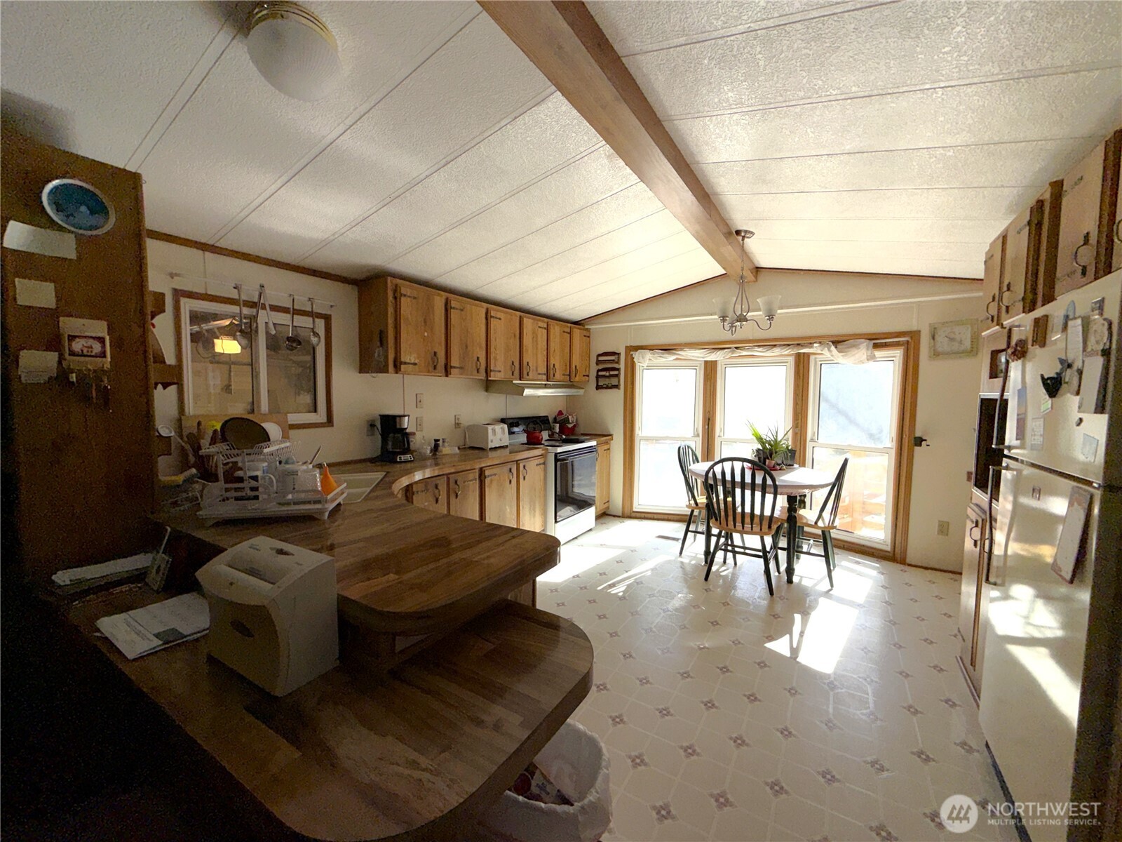 155 St Peters Creek Road Malo, WA 99150 - Photo 4 of 40 a living room with furniture and a large window