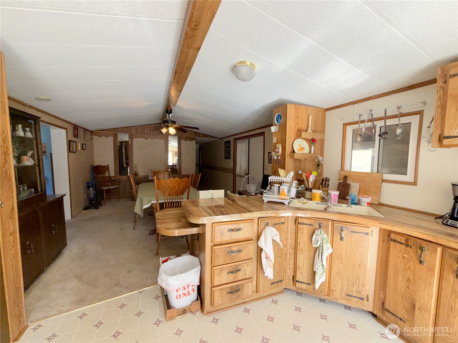 155 St Peters Creek Road Malo, WA 99150 - Photo 7 of 40 a very nice looking open kitchen with stainless steel appliances granite countertop a stove and a sink
