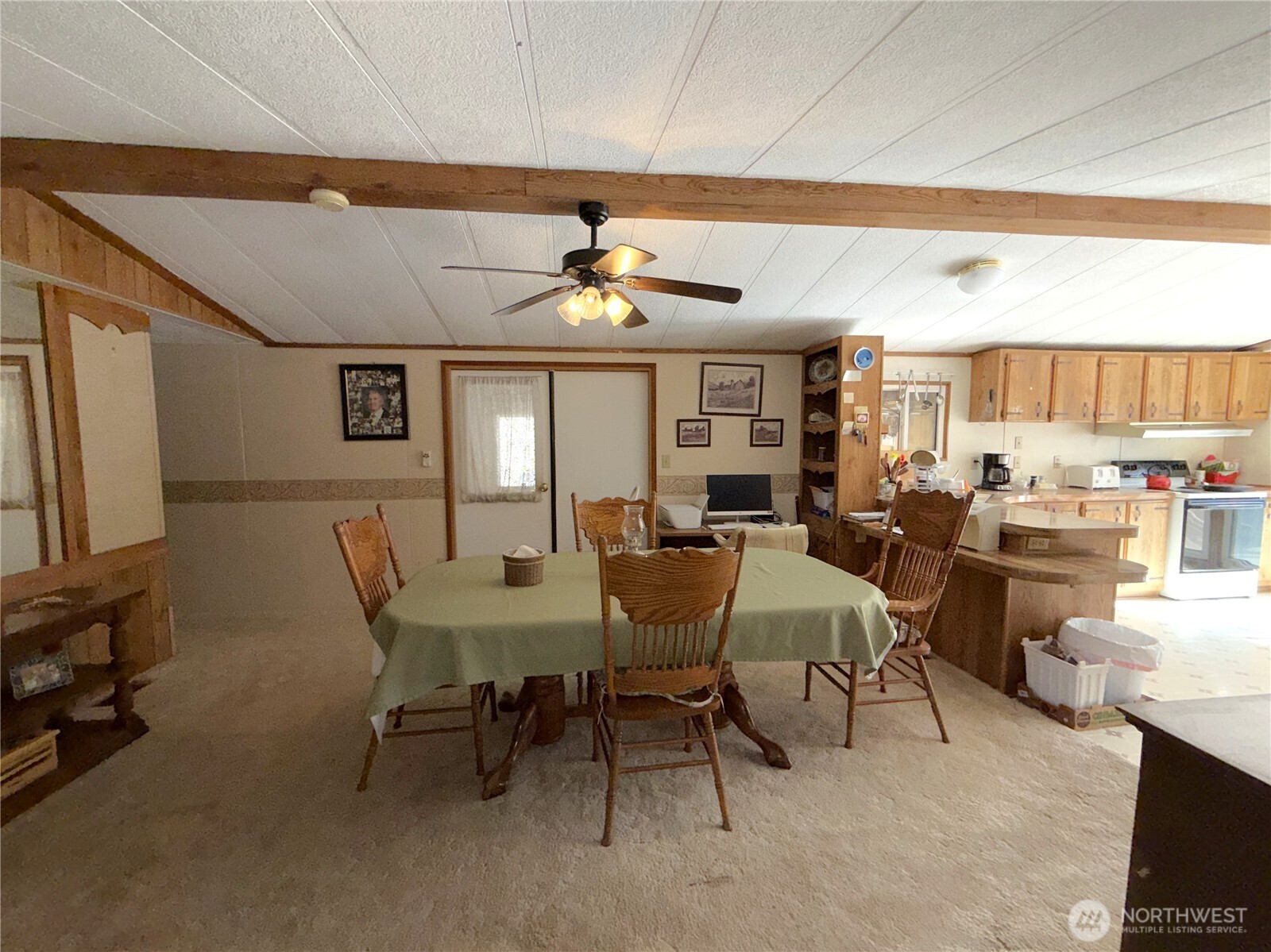 155 St Peters Creek Road Malo, WA 99150 - Photo 8 of 40 a view of a dining room with furniture