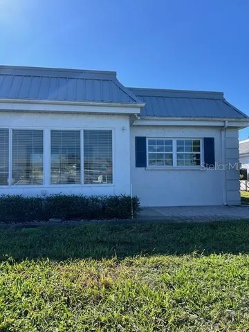 a view of a house with a garden
