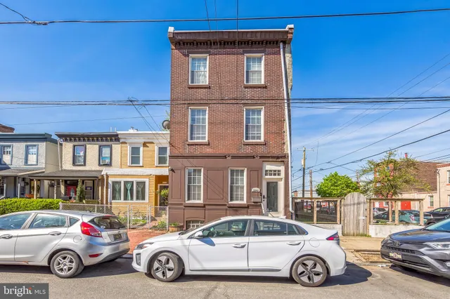 a car parked in front of a house
