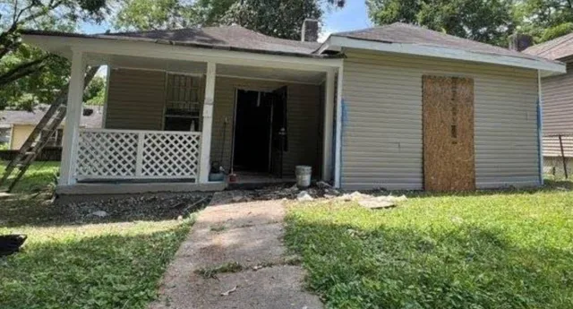 a view of a house with a small cabin