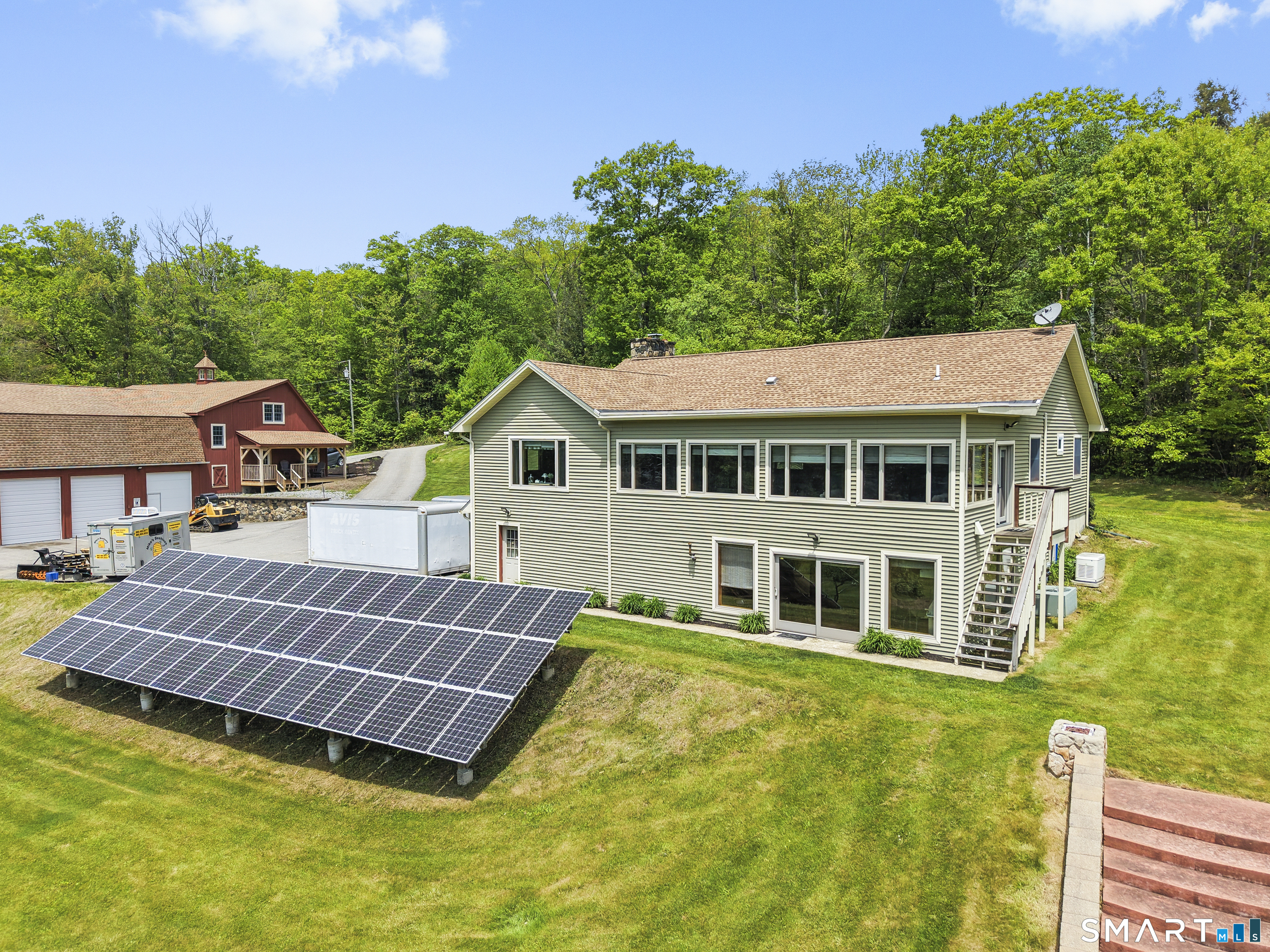 80 Holmes Road Goshen, CT 06756 - Photo 6 of 40 a aerial view of a house with swimming pool next to a yard