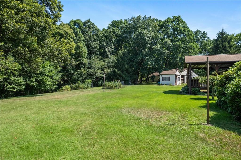 285 Rochester Road Freedom, PA 15042 - Photo 11 of 46 a view of a house with backyard and sitting area