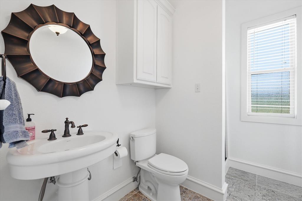 4920 Peden Road Fort Worth, TX 76179 - Photo 20 of 40 Full Guest Bathroom with Pool Access.