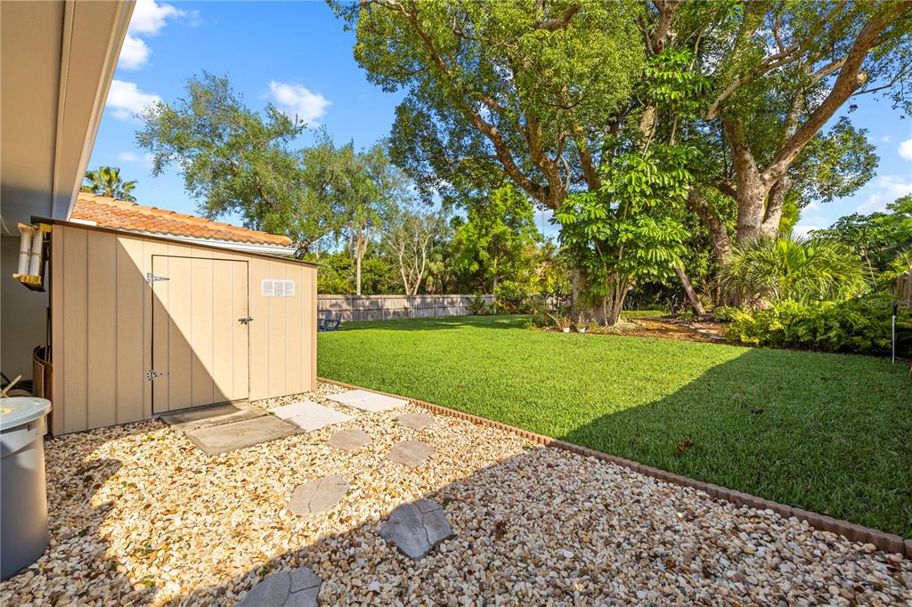 11781 68th Avenue Seminole, FL 33772 - Photo 39 of 60 a backyard of a house with lots of green space