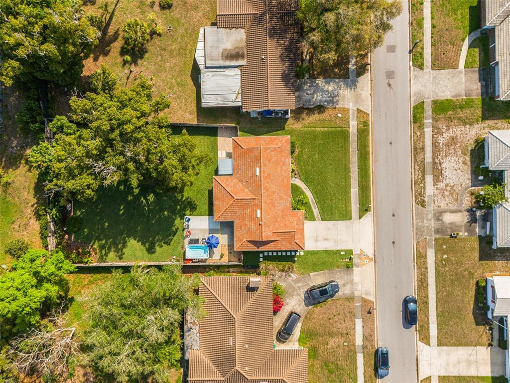 11781 68th Avenue Seminole, FL 33772 - Photo 51 of 60 an aerial view of residential house with outdoor space and swimming pool