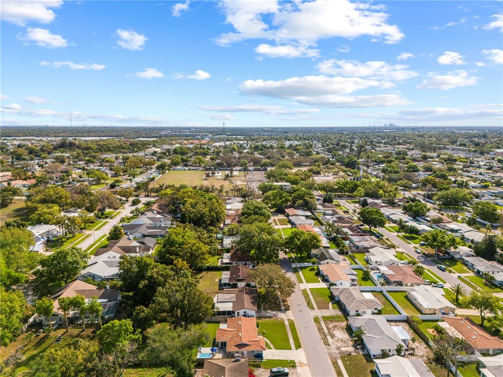 11781 68th Avenue Seminole, FL 33772 - Photo 57 of 60 an aerial view of residential building with parking space