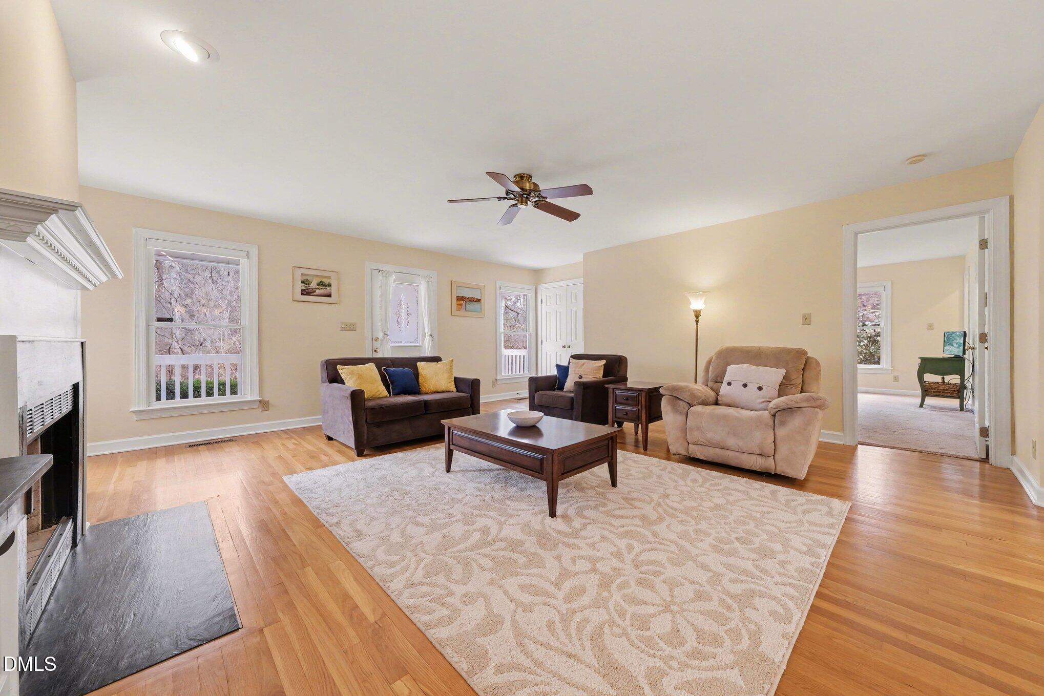 2404 Bane Road Efland, NC 27243 - Photo 12 of 46 a living room with furniture and a flat screen tv