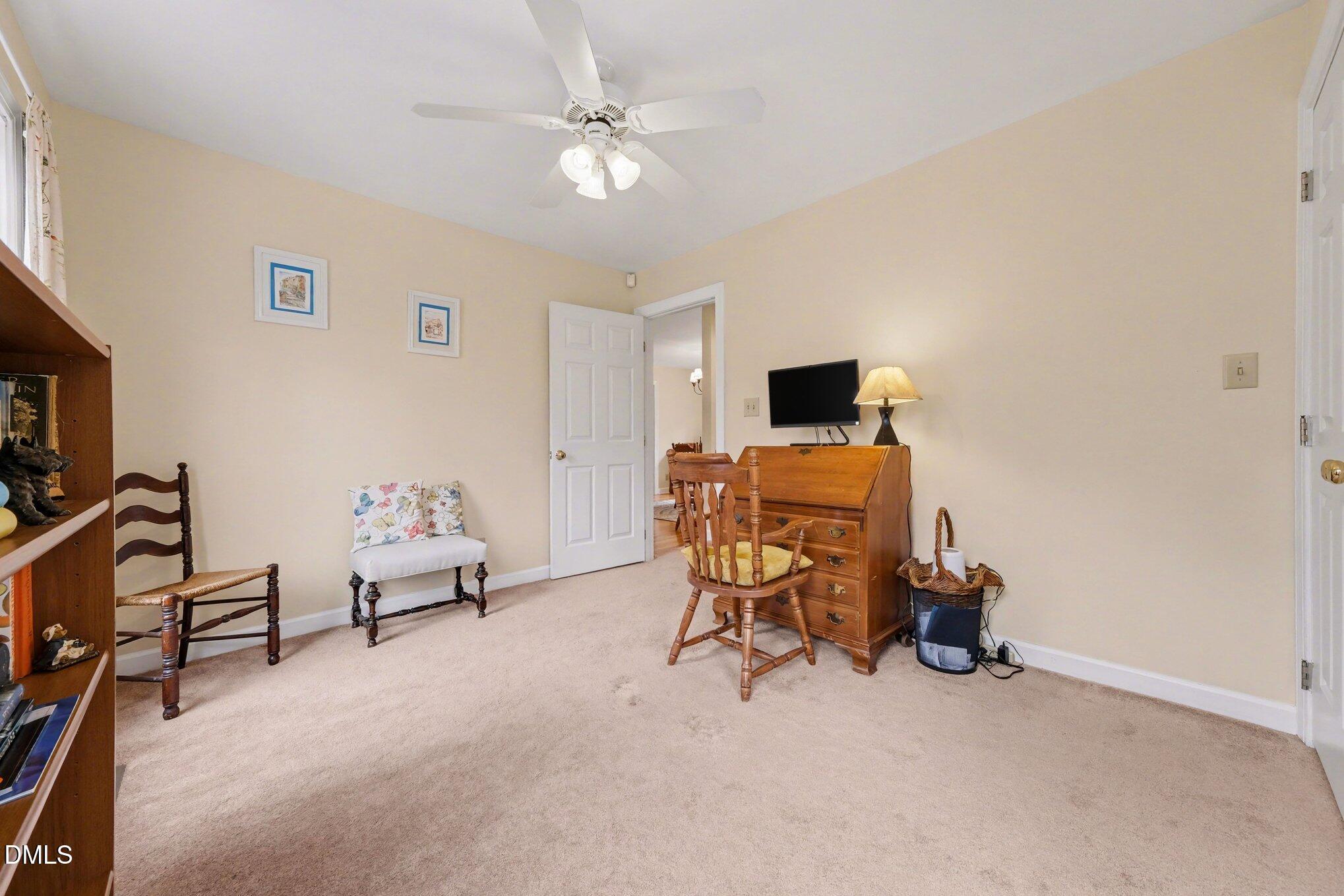 2404 Bane Road Efland, NC 27243 - Photo 25 of 46 a view of a livingroom with furniture and a flat screen tv