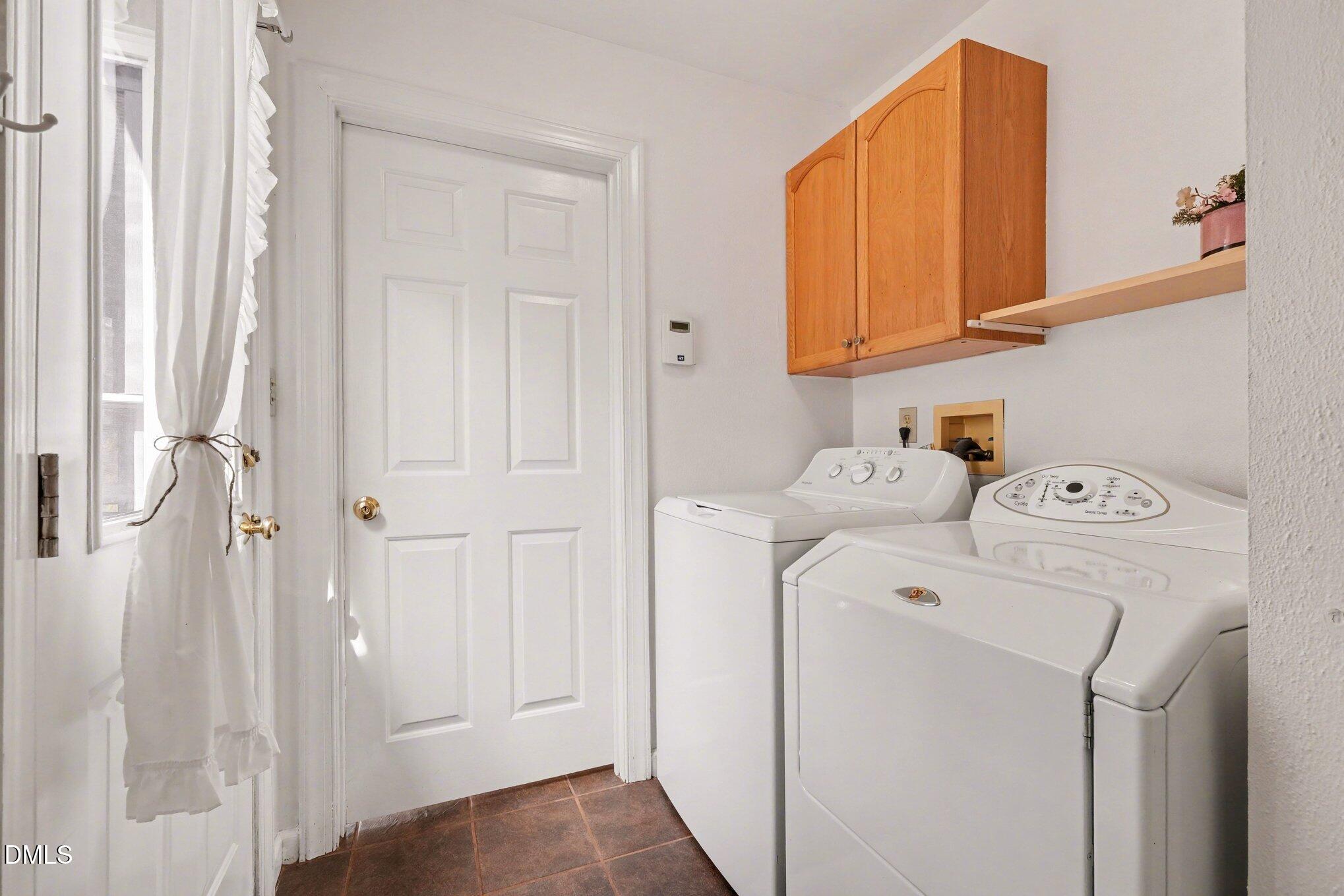 2404 Bane Road Efland, NC 27243 - Photo 29 of 46 a utility room with dryer and washer