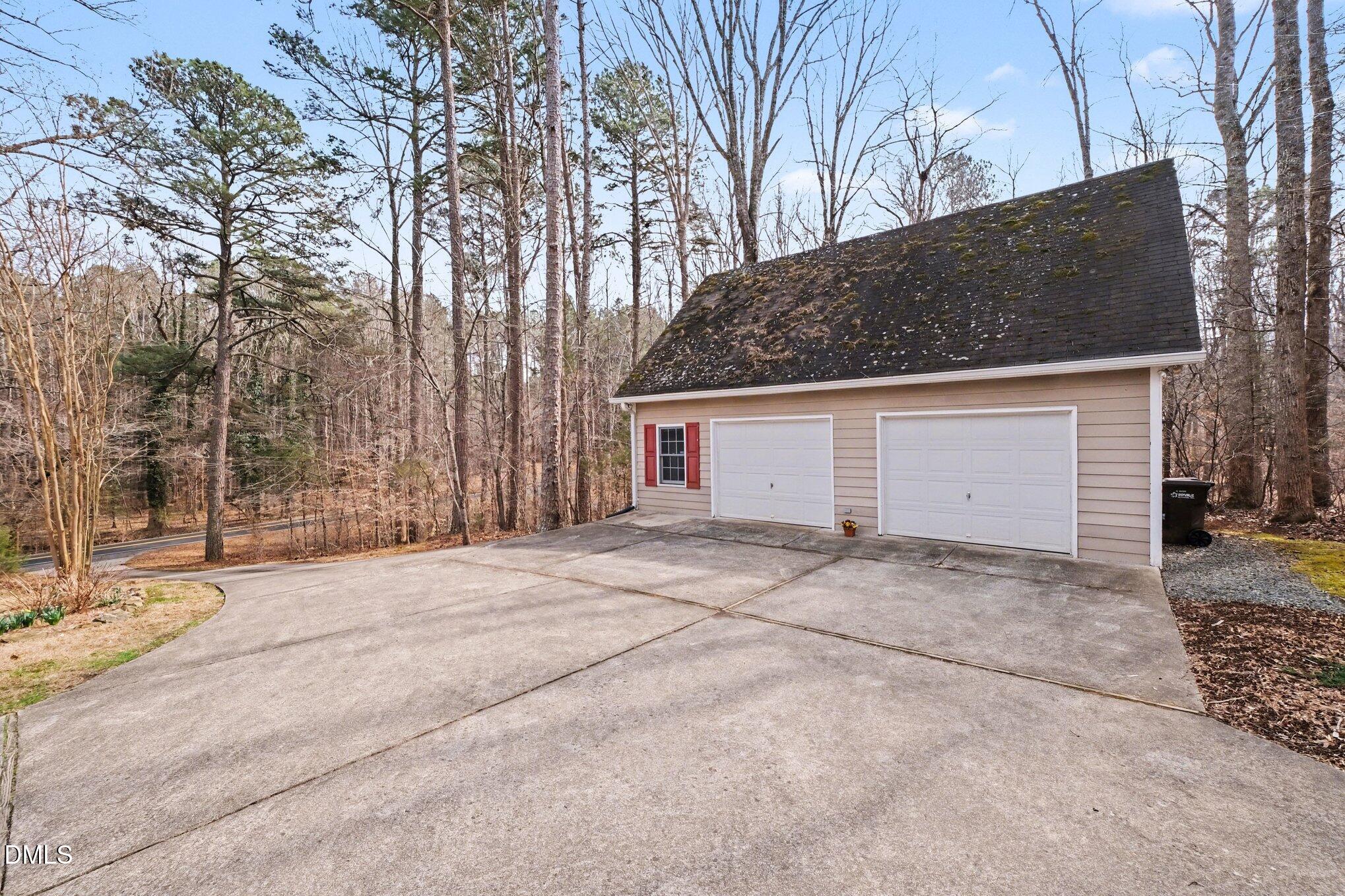 2404 Bane Road Efland, NC 27243 - Photo 5 of 46 a view of garage and yard
