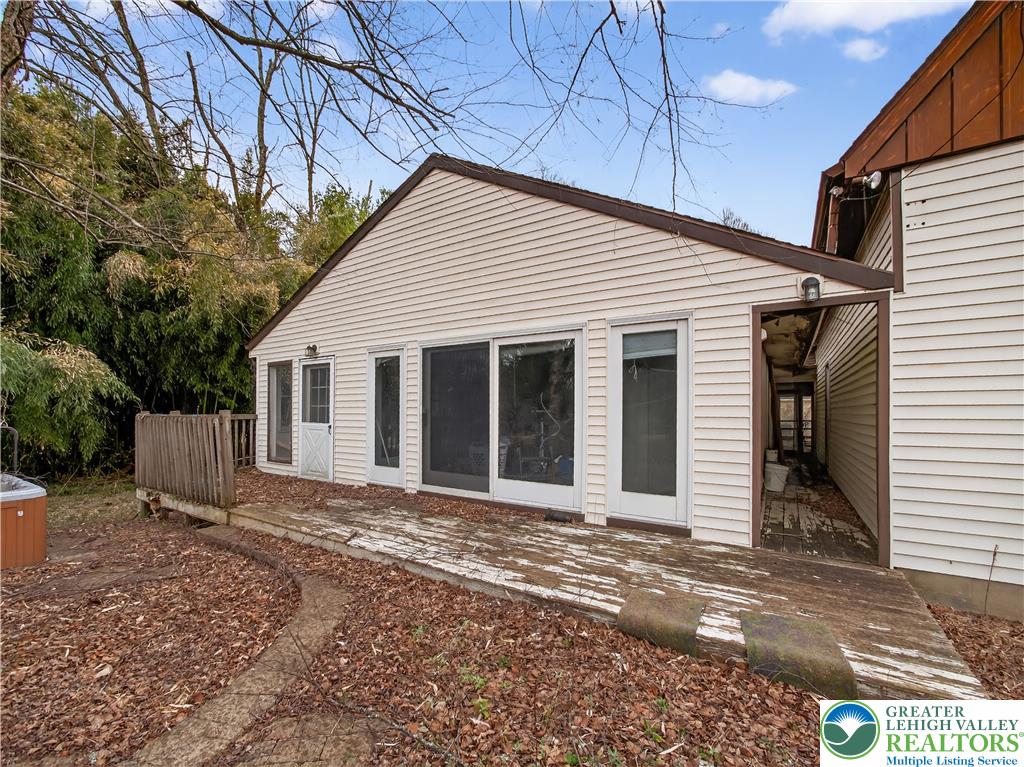 2197 Buck Run Road Quakertown, PA 18951 - Photo 45 of 45 A spacious back deck with ample light provides seamless indoor-outdoor living.