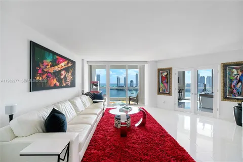 a kitchen with stainless steel appliances a refrigerator and a stove top oven