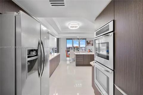 a room with gym equipment and a large window