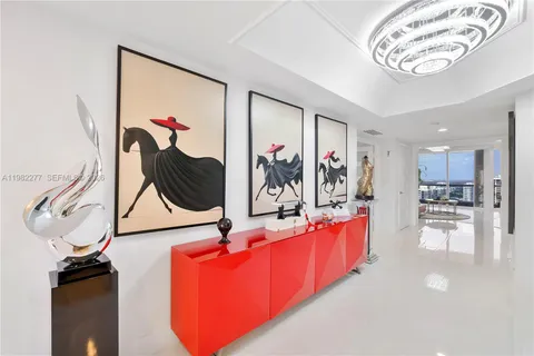 a bedroom with a bed and a flat screen television