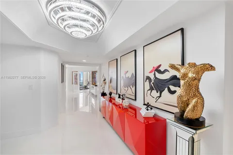 a bathroom with a double vanity sink mirror and shower