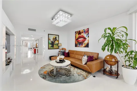 a view of walk in closet with clothes