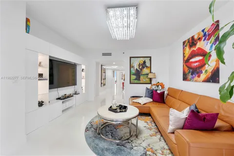 a view of a fountain and a potted plant