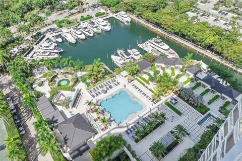 a view of outdoor kitchen with palm trees
