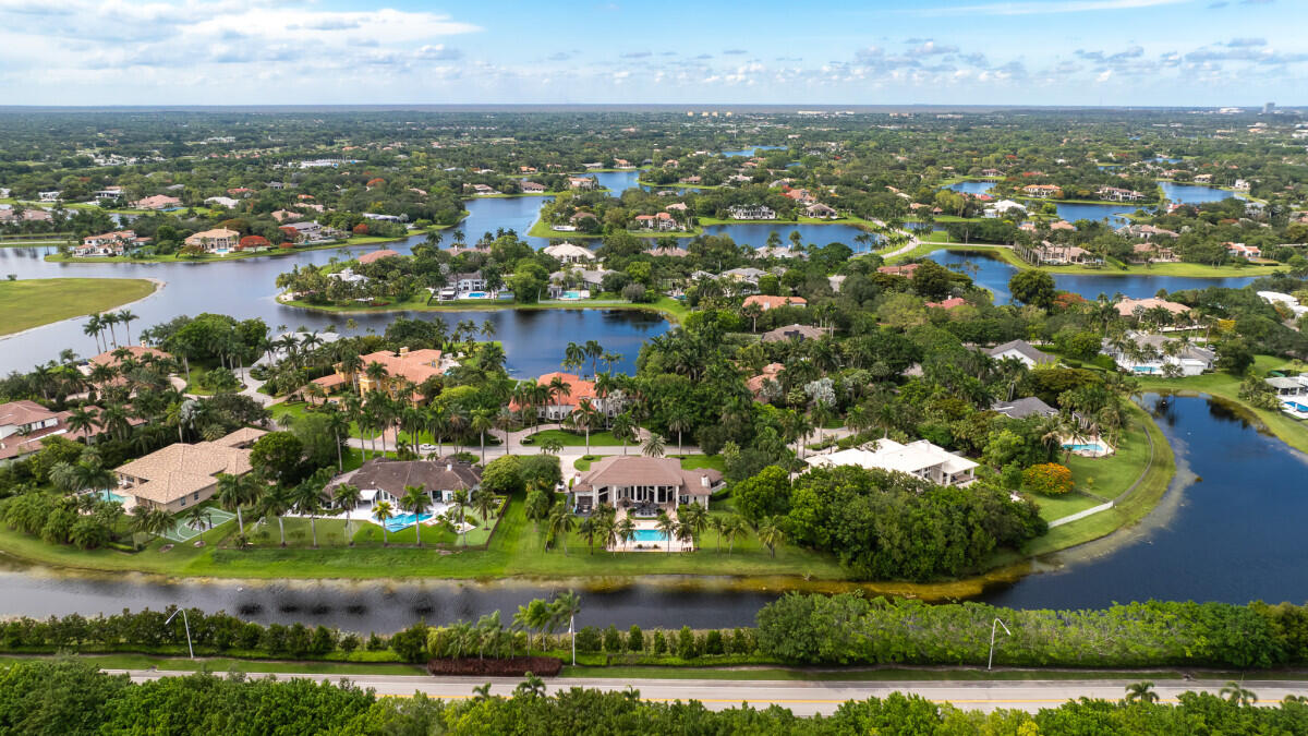 3500 Windmill Ranch Road Weston, FL 33331 - Photo 44 of 47 an aerial view of residential houses with outdoor space and lake view