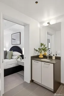 a en suite bathroom with a sink and a mirror