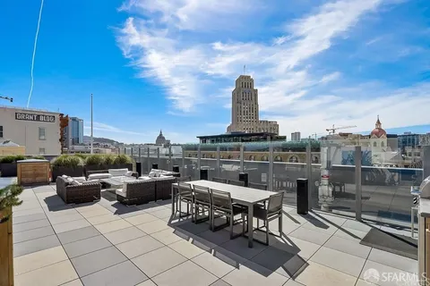 a view of a terrace with furniture