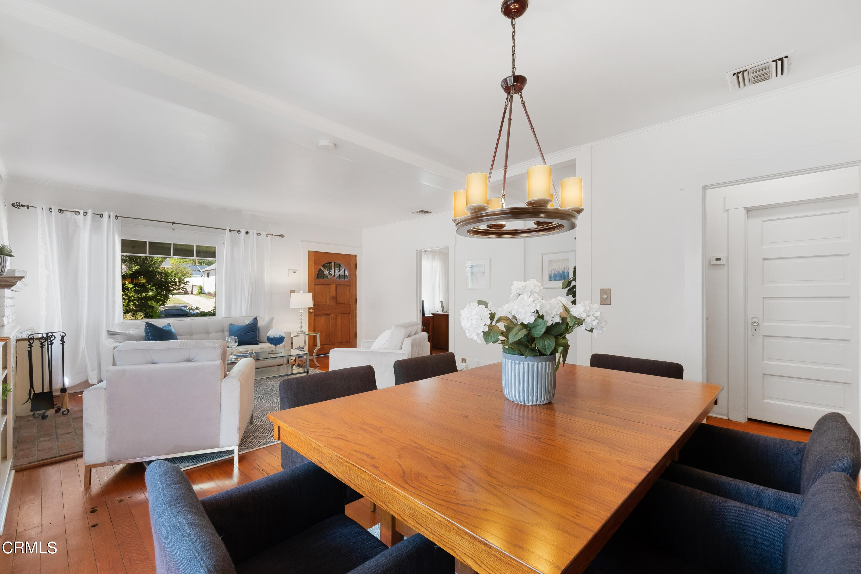 1640 Brigden Road Pasadena, CA 91104 - Photo 11 of 39 a view of a dining room with furniture and chandelier